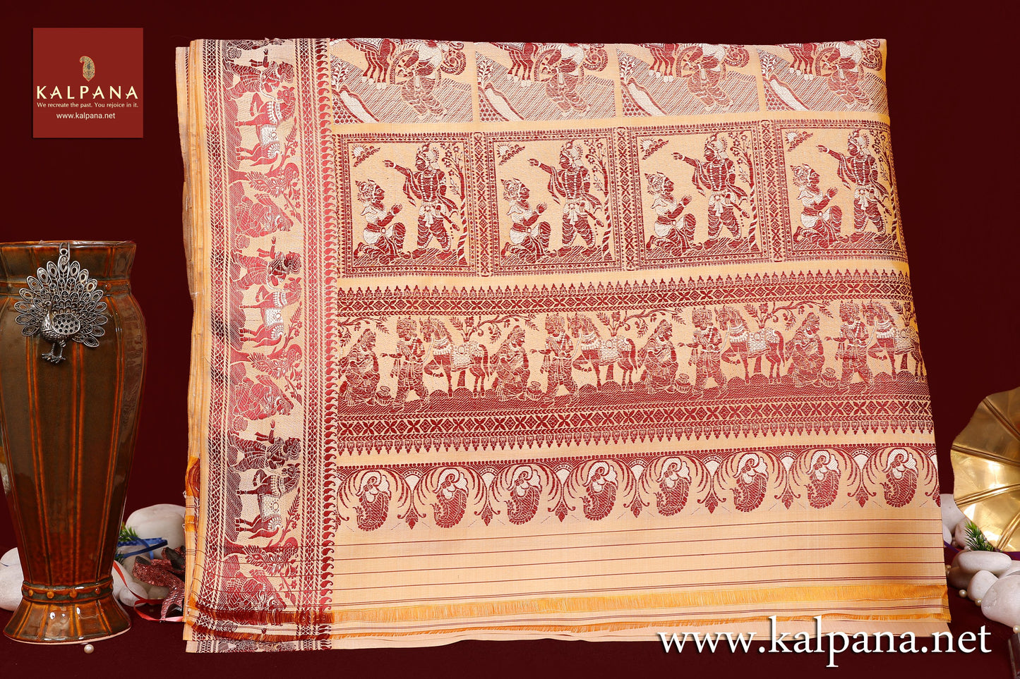Baluchari Handloom Pure Silk Saree with All Over Woven Motifs and Woven Border. The Palla is Woven. It comes with Self Colored Plain Unstitched Blouse with Woven Border. Perfect for Multi Occasion Wear. Recommended for All season(s). Dry Clean Only