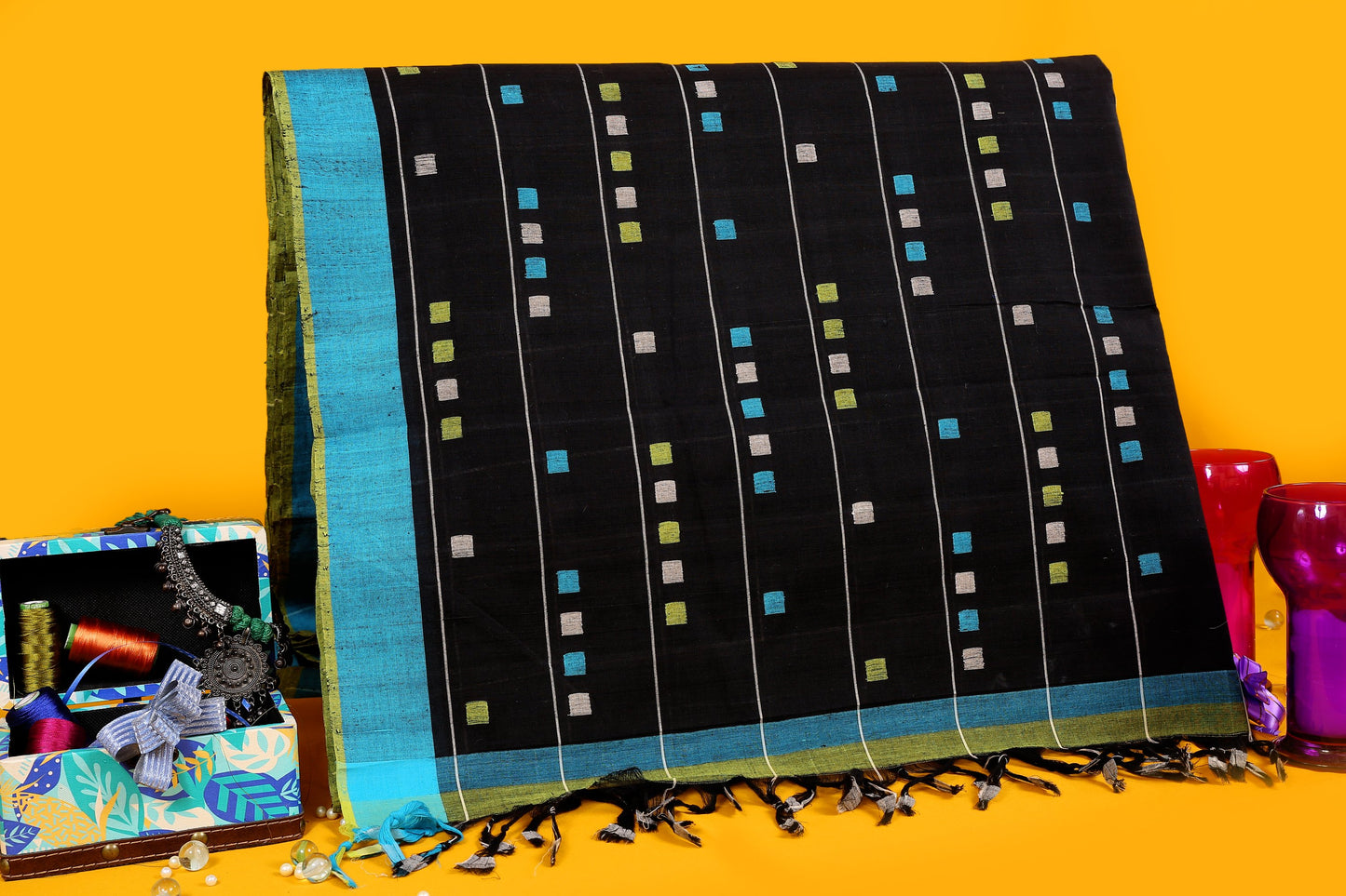 Handloom Pure Cotton Saree with All Over Motifs and Woven Border. The Palla is Woven. It comes with Self Colored Woven Unstitched Blouse with Woven Border. Perfect for Casual Wear. Recommended for Summer season(s). Dry Clean Only