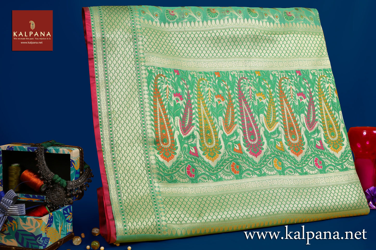 Benarasi Woven Blended Cotton Saree with All Over Jaal and Woven Zari Border. The Palla is Woven Zari. It comes with Self Colored Plain Unstitched Blouse with Woven Border. Perfect for Formal Wear. Recommended for all season(s). Dry Clean Only