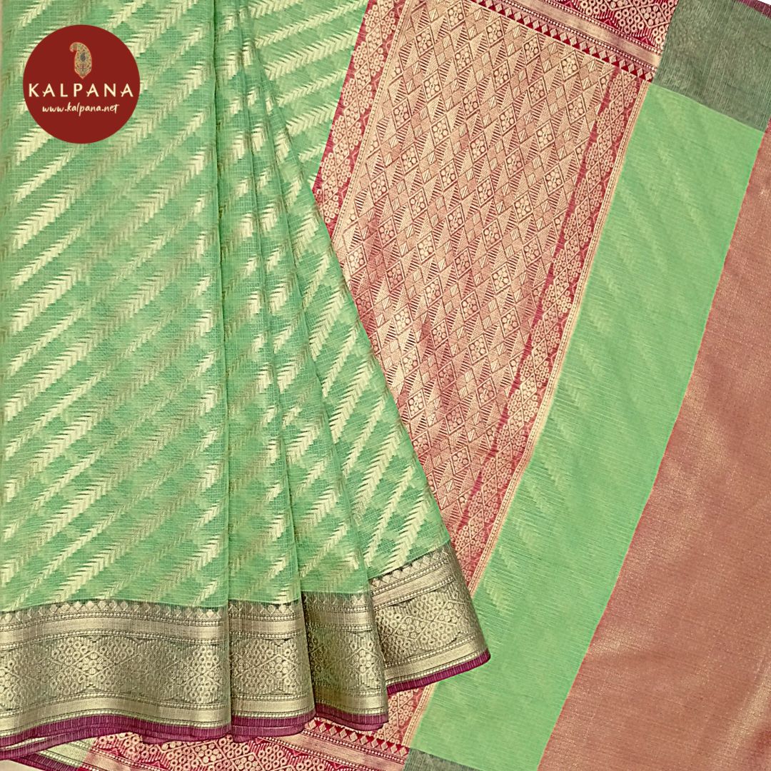 Woven Blended Silk Kota Saree with All Over Stripes and Zari Border. The Palla is Zari. It comes with Contrast Colored Brocade Unstitched Blouse with . Perfect for Multi Occasion Wear. Recommended for Festive season(s). Dry Clean Only
Saree 5.4 mts
Blouse 0.8 mts
Country Of Origin:India
Weight: 500 gms