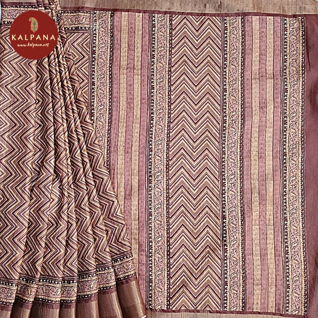 Brown Printed Blended Tussar Silk Saree with Zari Border.The Self colored Printed Unstitched Blouse has Zari Border Perfect for Multi Occasion Wear in Festive season(s). Dry Clean Only.
Saree 5.4 mts
Blouse 0.8 mts
Country Of Origin:India
Weight: 500 gms