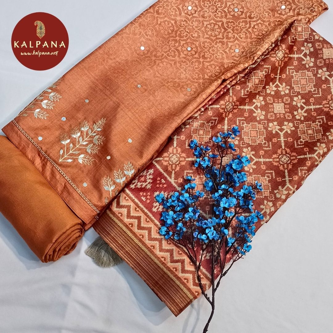Shirt: Orange Coloured Embroidery Blended Tussar Unstitched Suit with All Over Embroidery and Embroidered Border..
Dupatta: Self Matched Rust Orange Color Printed Tussar Dupatta with Printed Border.
Salwar: Russet Brown Tussar .
Perfect for Multi Occasion Wear. 
Recommended for Autumn & Winter season(s). Dry Clean Only
Shirt Fabric: 2.5 mts
Salwar Fabric: 2.4 mts
Dupatta: 2.4 mts
Country Of Origin:India
Weight: 500 gms