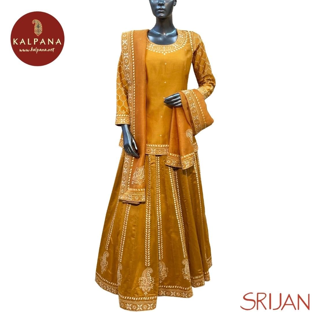 Top : Chikkankari Princess Line Pure Chanderi Shirt with All Over Embroidery and Embroidered Border. The Neckline is Round
Dupatta: It comes with Self matched Mustard Yellow color Embroidered Chikkan Super Net Dupatta with Embroidered Border.
Bottom : The Cotton Satin Lehenga is Mustard Yellow.
Perfect for Semi Formal Wear. Recommended for Summer season(s). Dry Clean Only
Country Of Origin:India
Weight: 450 gms