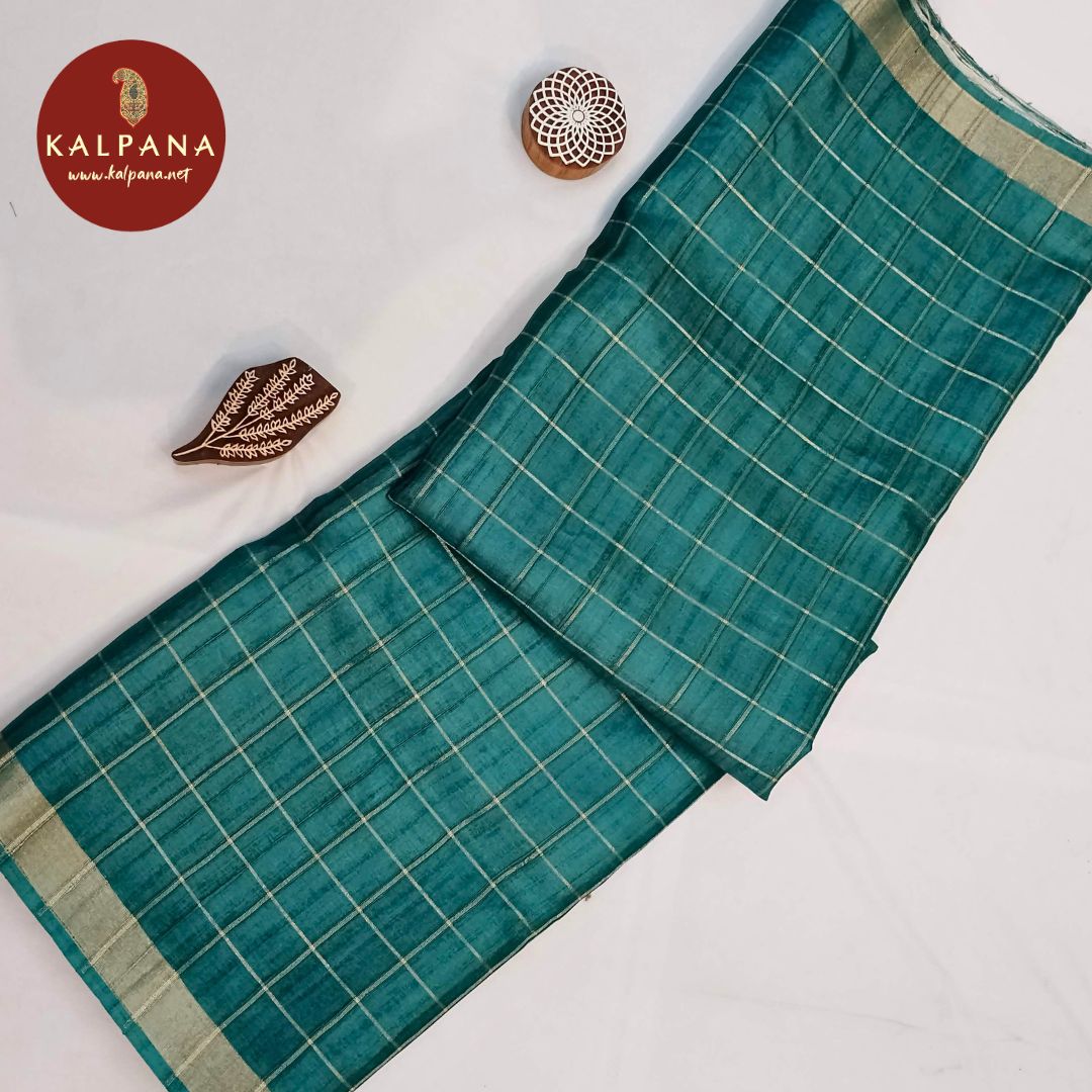 Teal Woven Zari Printed Tussar Silk Saree
with Woven Zari Teal Color Palla,Border
The Grey Colored Woven Zari Tussar Silk Unstitched Blouse
Which is Perfect for Semi,Formal,Wear in Summer season(s). Dry Clean Only.
Saree 5.4 mts
Blouse 0.8 mts
Country Of Origin:India
Weight: 500 gms