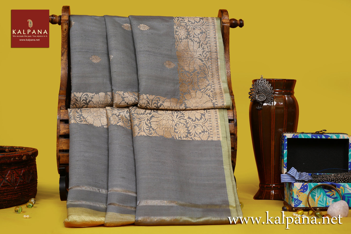 Banarsi Handloom Pure Tussar Saree with All Over Woven Motifs and Woven Zari Border. The Palla is  Woven Zari. It comes with Contrast Colored Woven Unstitched Blouse with . Perfect for Formal Wear.  Recommended for Autumn & Winter season(s). Dry Clean Only