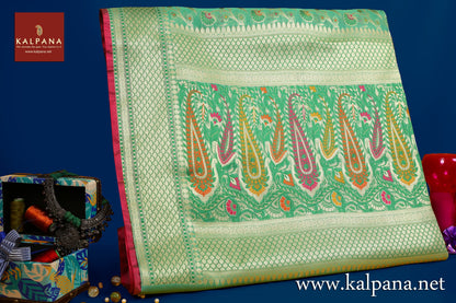 Benarasi Woven Blended Cotton Saree with All Over Jaal and Woven Zari Border. The Palla is  Woven Zari. It comes with Self Colored Plain Unstitched Blouse with Woven Border. Perfect for Formal Wear.  Recommended for all season(s). Dry Clean Only