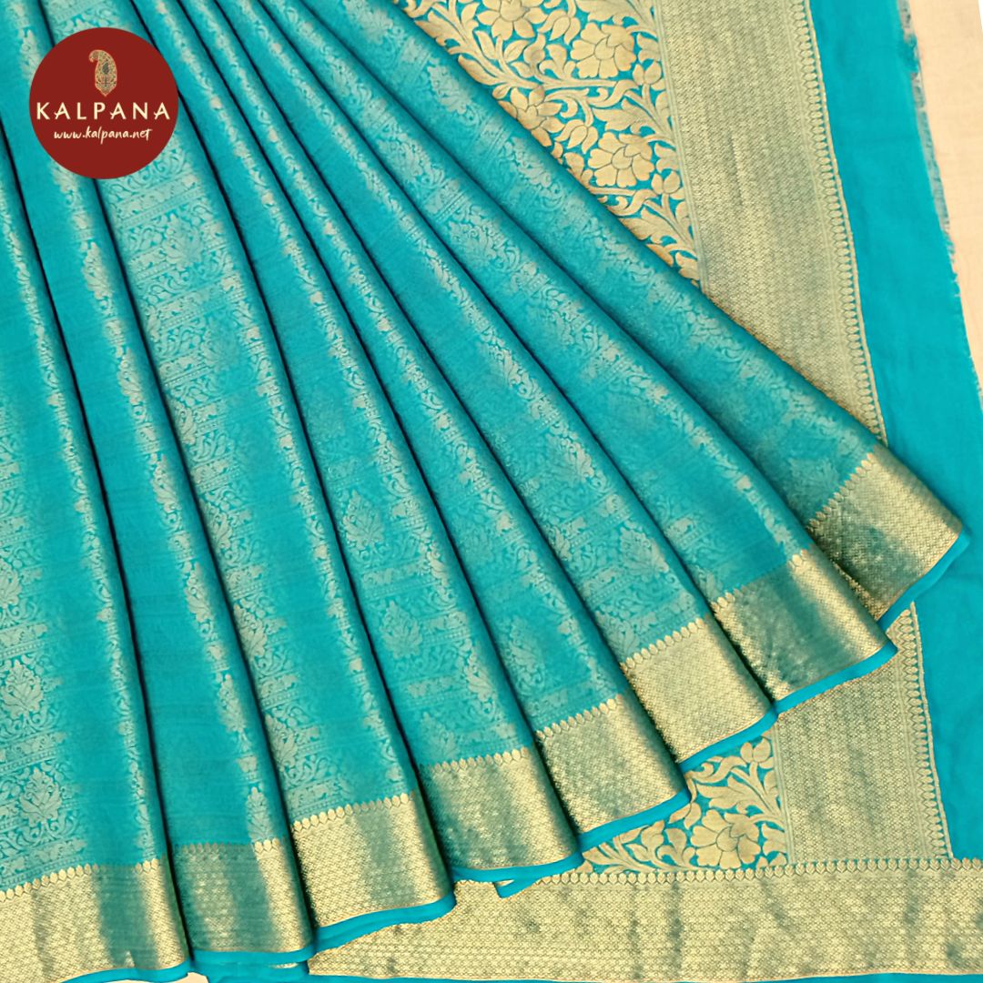 Woven Blended Georgette Saree with All Over Jaal and Zari Border. The Palla is Woven Zari. It comes with Self Colored Plain Unstitched Blouse with Zari Border. Perfect for Multi Occasion Wear. Recommended for Festive season(s). Dry Clean Only
Saree 5.4 mts
Blouse 0.8 mts
Country Of Origin:India
Weight: 500 gms