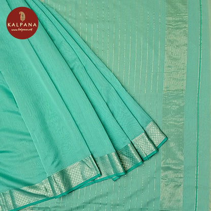 Handloom Pure Maheshwari Cotton Saree with All Over Plain Saree and Zari Border. The Palla is Zari. It comes with Self Colored Plain Unstitched Blouse with Zari Border. Perfect for Multi Occasion Wear. Recommended for Festive season(s). Dry Clean Only
Saree 5.4 mts
Blouse 0.8 mts
Country Of Origin:India
Weight: 500 gms