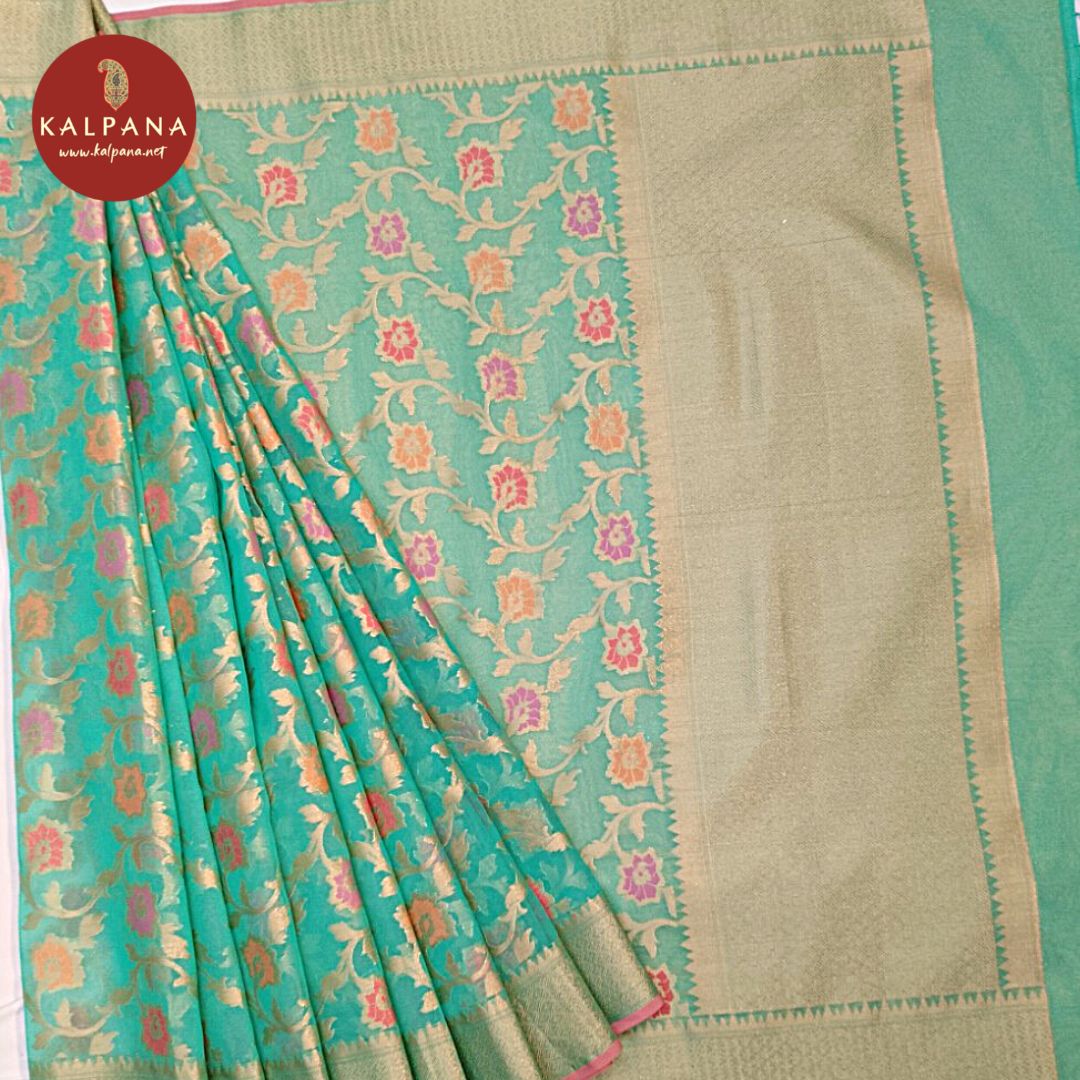Woven Blended Kora Saree with All Over Weaving Zari and Zari Border. The Palla is Zari. It comes with Self Colored Brocade Unstitched Blouse with . Perfect for Multi Occasion Wear. Recommended for Festive season(s). Dry Clean Only
Saree 5.4 mts
Blouse 0.8 mts
Country Of Origin:India
Weight: 500 gms