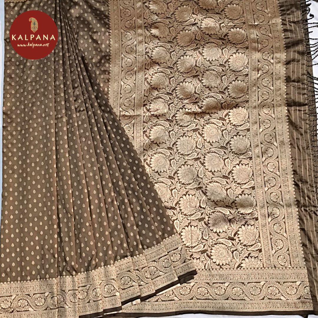 Peanut Brown Woven Blended Silk Saree with Zari Border.The Self colored Motifs Unstitched Blouse has Zari Border Perfect for Multi Occasion Wear in Festive season(s). Dry Clean Only.
Saree 5.4 mts
Blouse 0.8 mts
Country Of Origin:India
Weight: 500 gms
