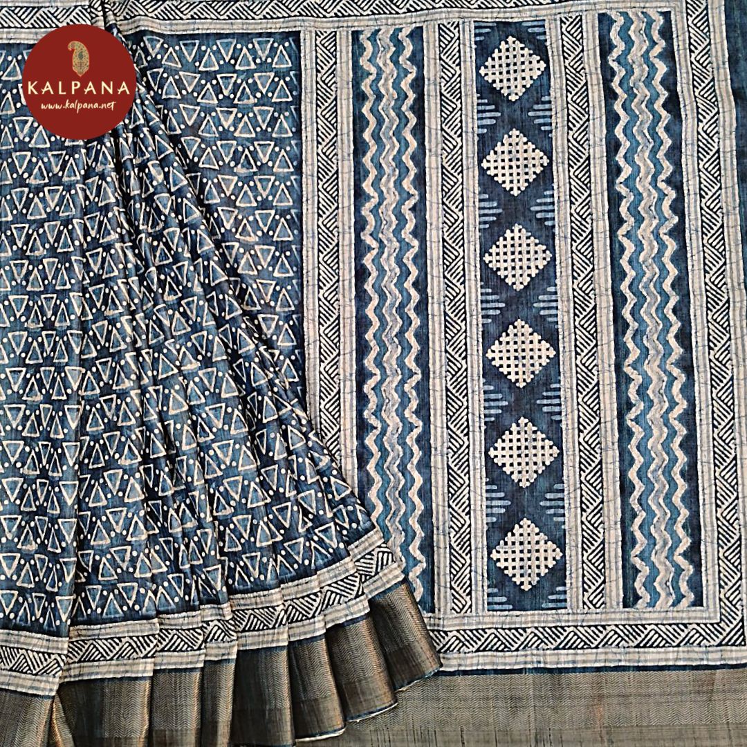 Admiral Blue Printed Blended Tussar Silk Saree with Zari Border.The Self colored Printed Unstitched Blouse has Zari Border Perfect for Multi Occasion Wear in Festive season(s). Dry Clean Only.
Saree 5.4 mts
Blouse 0.8 mts
Country Of Origin:India
Weight: 500 gms