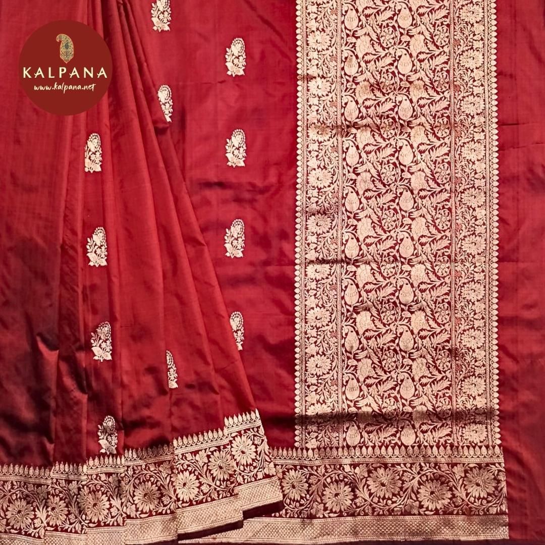 Maroon Banarasi Handloom Pure Silk Saree with Woven Zari Border. The Palla is Woven Zari. The Self colored Plain Unstitched Blouse with woven border has Zari Border Perfect for Semi Formal Wear in Summer season(s). Dry Clean Only.
Saree 5.4 mts
Blouse 0.8 mts
Country Of Origin:India
Weight: 500 gms