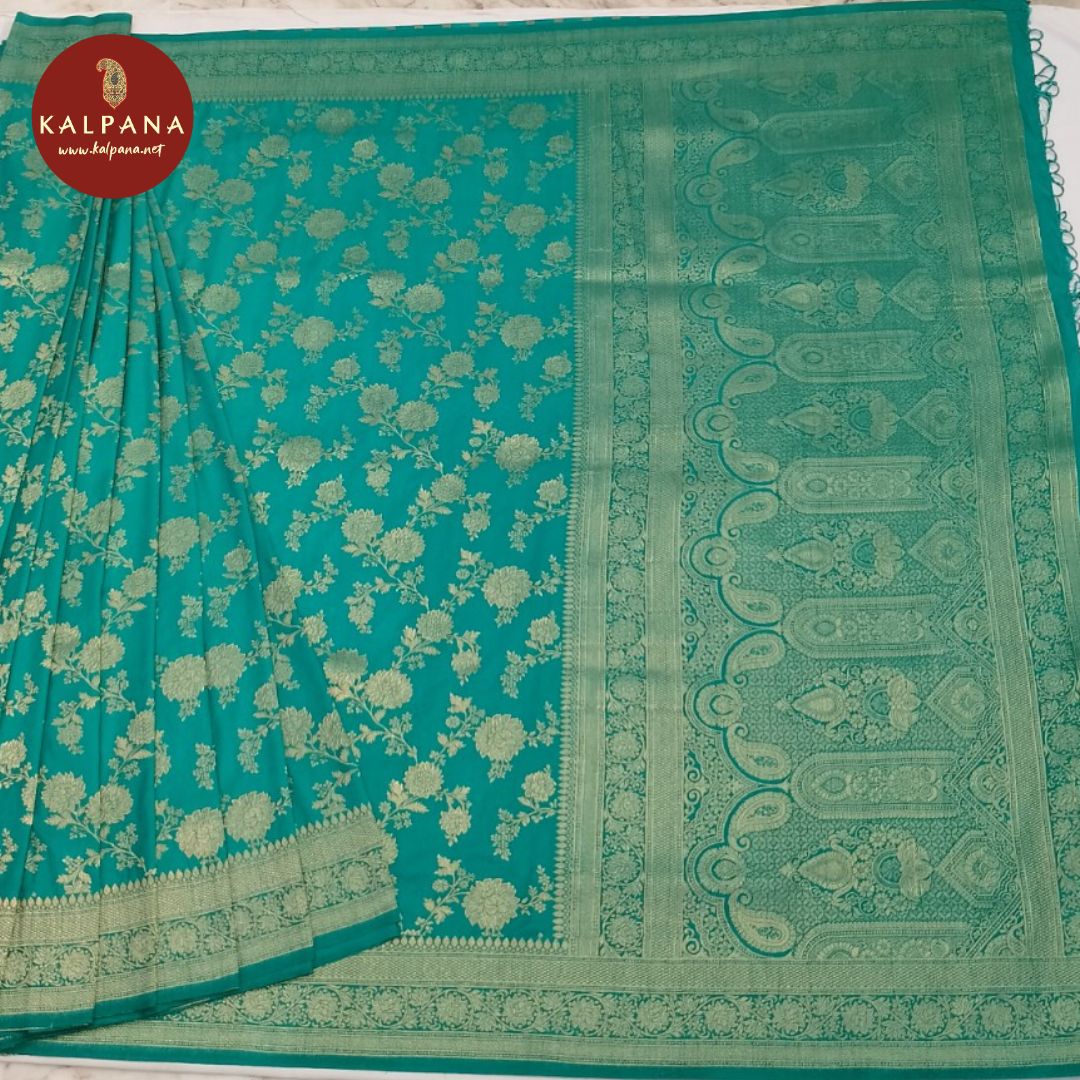 rama green Coimbatore Woven Blended SICO Silk Saree with Zari Border. The Palla is Woven Zari. The Self colored Plain Unstitched Blouse has Zari Border Perfect for Semi Formal Wear in season(s). Dry Clean Only.
Saree 5.4 mts
Blouse 0.8 mts
Country Of Origin:India
Weight: 500 gms