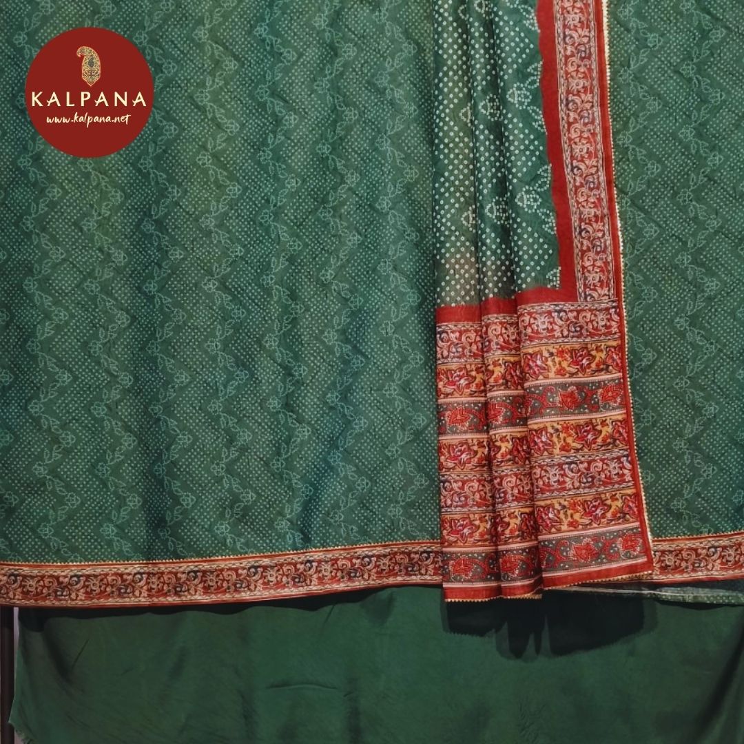 Shirt: Bandhani Printed Blended SICO Cotton Unstitched Suit with All Over Printed and Printed Border.
Dupatta: Contrast matched Emerald Green color Printed SICO Cotton Dupatta with Printed Border.
The SICO Cotton Salwar is Emerald Green.
Perfect for Semi Formal Wear. 
Recommended for Summer season(s). Dry Clean Only
Shirt Fabric: 2.5 mts
Salwar Fabric: 2.4 mts
Dupatta: 2.4 mts
Country Of Origin:India
Weight: 500 gms