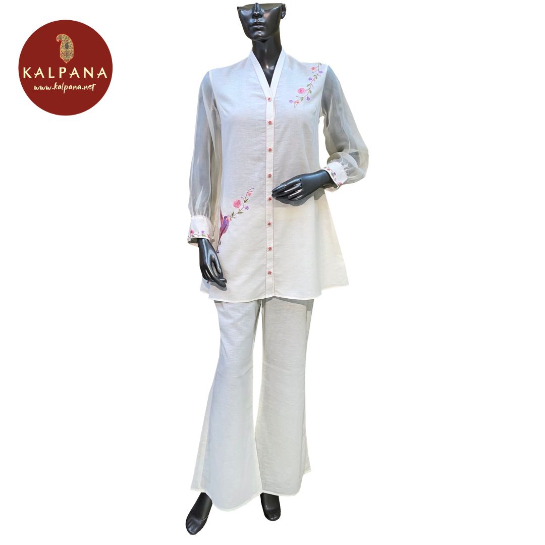 Top : Parsi Gara Short A Line Pure Linen Shirt with Front Embroidery. The Neckline is Embroidered
Bottom : The Cotton Satin Parallel Pants is Off White.
Perfect for Semi Formal Wear. Recommended for season(s). Dry Clean Only
Country Of Origin:India
Weight: 500 gms